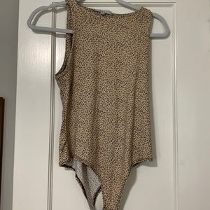 Never worn or washed! Cheeta Print body suit